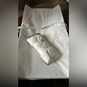 Non slip changing mat and new towelling cover